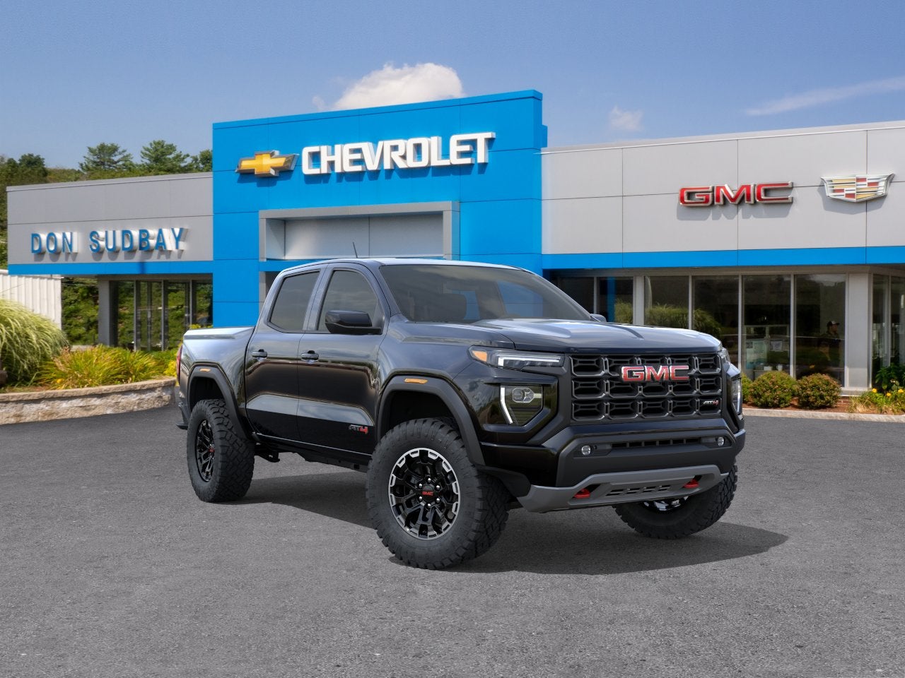 2026 GMC Canyon AT4 in Onyx Black — front three-quarter view