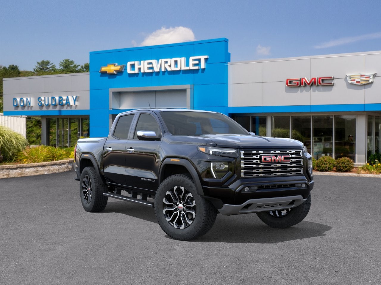 2026 GMC Canyon Denali in Onyx Black — front three-quarter view