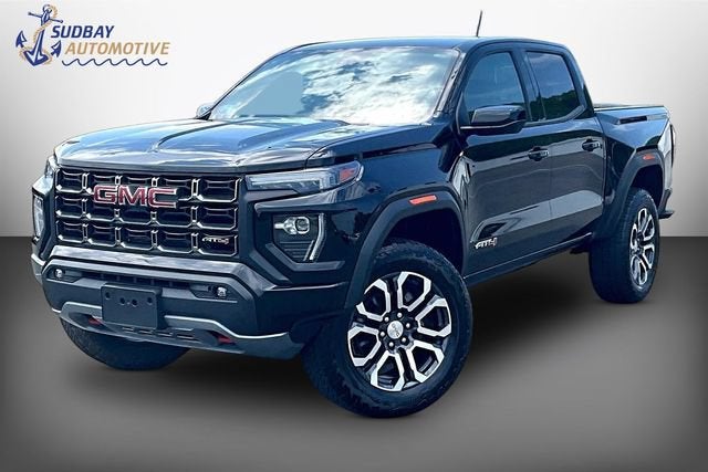 2024 GMC Canyon AT4 in Onyx Black — front three-quarter view
