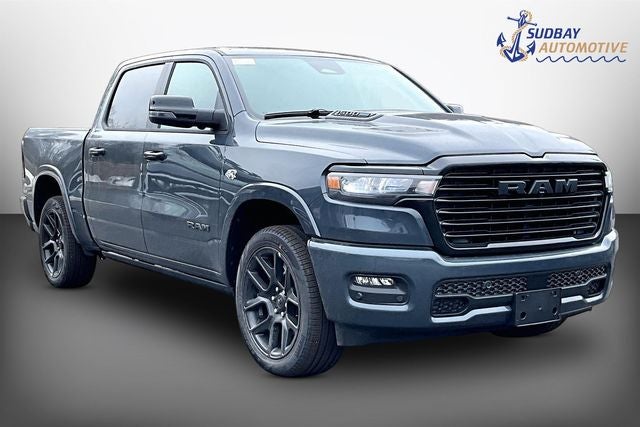 2026 RAM 1500 Laramie in Forged Blue Metallic — front three-quarter view